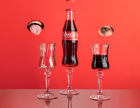 The iconic design of Coca Cola was used for re-design